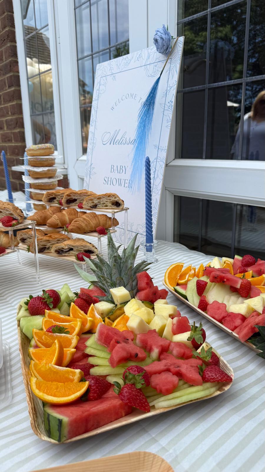 Baby shower fruit and pastry display